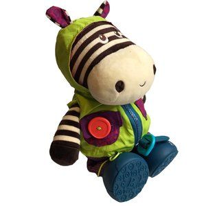 B. TOYS Plush Toy Moving Singing Dancing Vibrating Zebra Corduroy Purple Pants.